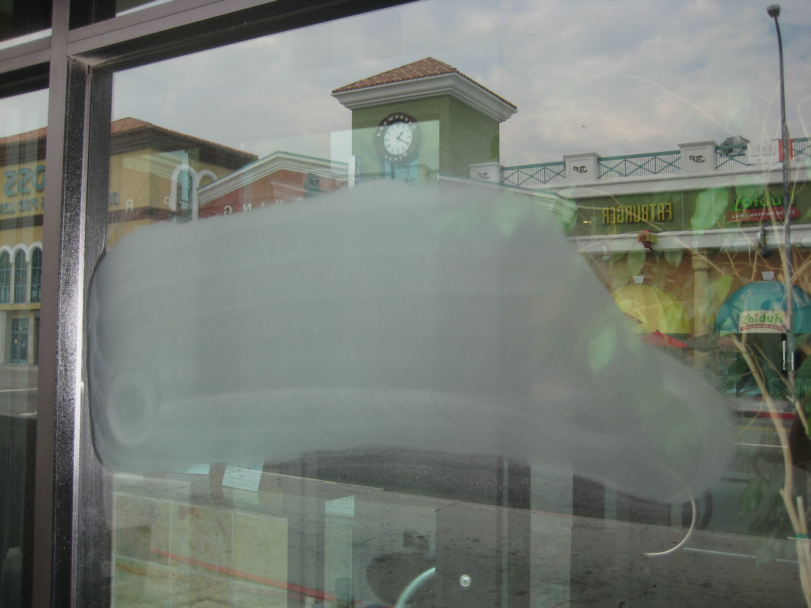 acid etched graffiti in window First step in glass graffiti removal is grinding out the scratches. Santa Monica, CA