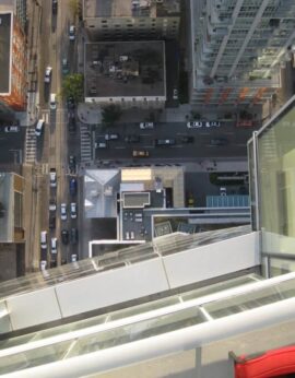 Shangri-La Toronto glass scratch removal - aerial view looking straight down glass curtainwall from 20th floor balcony