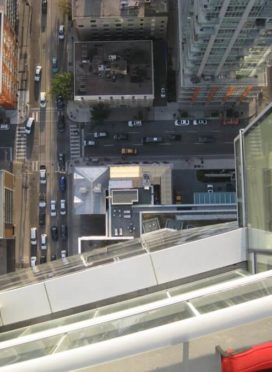 Shangri-La Toronto glass scratch removal - aerial view looking straight down glass curtainwall from 20th floor balcony