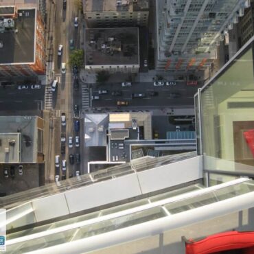 Shangri-La Toronto glass scratch removal - aerial view looking straight down glass curtainwall from 20th floor balcony