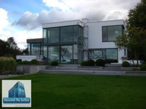 Glass Resurfacing Germany (Heikendorf) View of custom home in Europe in need of an expert window scratch remover. Kiel, Germany