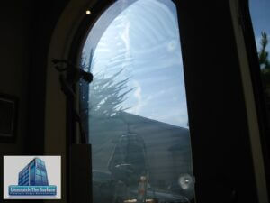 removing glass scratches restored this view of art