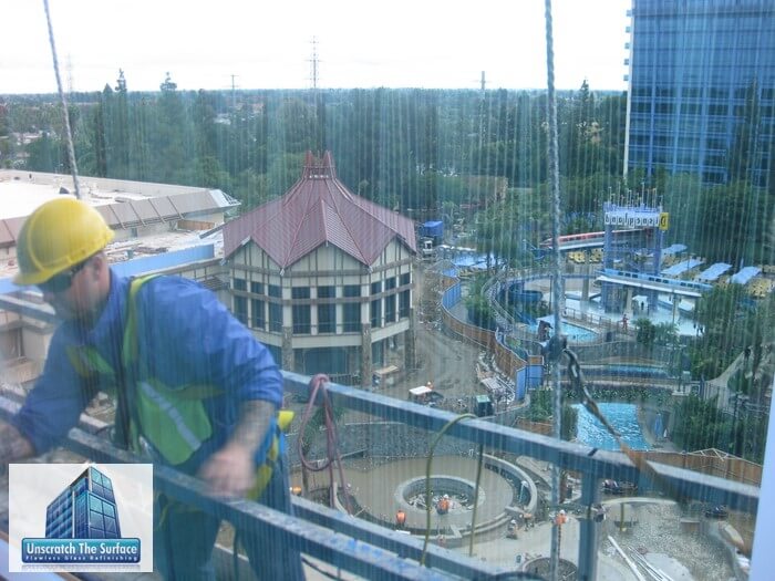 Reflection of Disneyland sign during glass restoration in Anaheim, CA