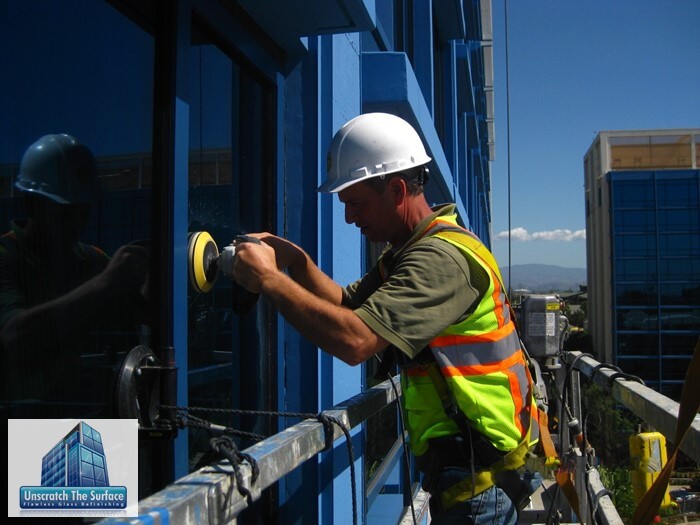 Glass polishing expert working on haze at Disney Hotel in Anaheim, CA.