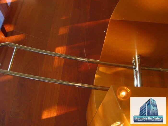 Remove Scratches from Glass Table | Bel Air CA Before grinding, closeup of single glass scratch removal in table top in Bel Air, CA