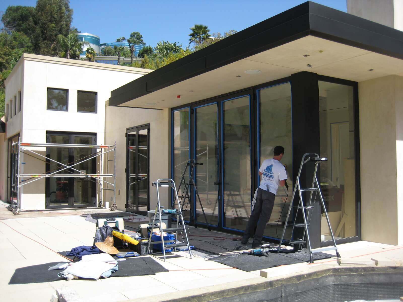 Getting scratches out of glass on custom home in Beverly Hills, CA.