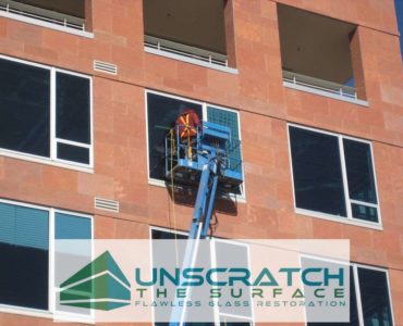 Remove glass scratches from Denver mid-rise windows