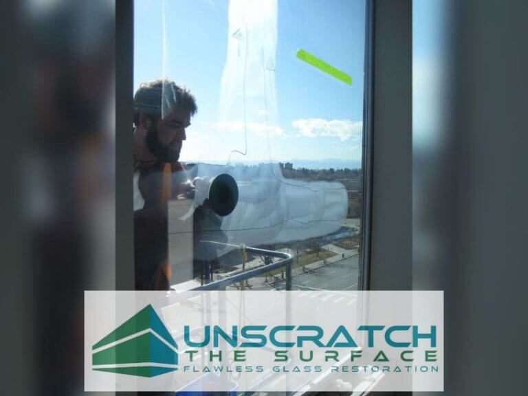 Remove Glass Scratches - Denver Mid Rise – 125 Windows Jeremy removing exterior tempered glass scratches while on boom lift in Denver, CO