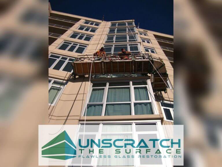 Expert 12-Story Commercial Glass Restoration - Chicago IL Removing glass scratches from swingstage highrise project in Chicago, IL.