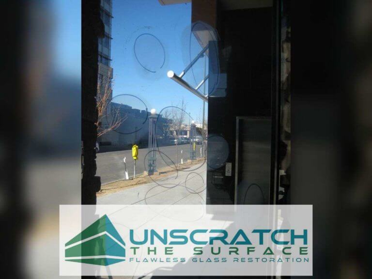 Remove Glass Scratches - Denver Mid Rise – 125 Windows Highlighted scratches being removed from tempered door in Denver, CO at North Creek Residences